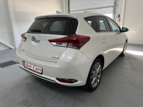 Toyota Auris HYBRID - AUTO/ LINE ASS/ HEAT/ PANORAMA - 24400 лв. - 77471692 4