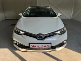 Toyota Auris HYBRID - AUTO/ LINE ASS/ HEAT/ PANORAMA - 24400 лв. - 77471692 2