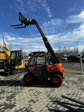 Телескопичен товарач Ausa T144H, снимка 10