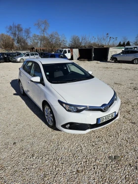 Toyota Auris 1.6 дизел, хечбек, снимка 16