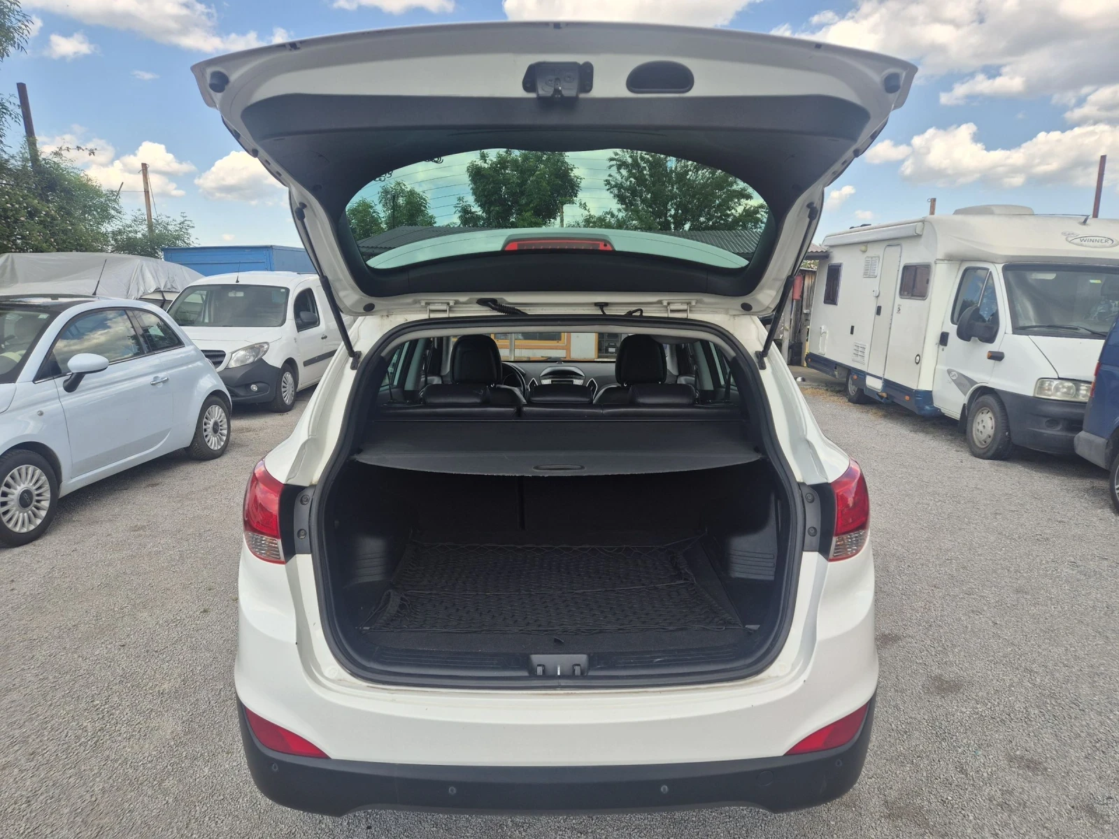 Hyundai IX35 2.0i/4x4/АВТОМАТИК, снимка 13 - Автомобили и джипове - 54770114