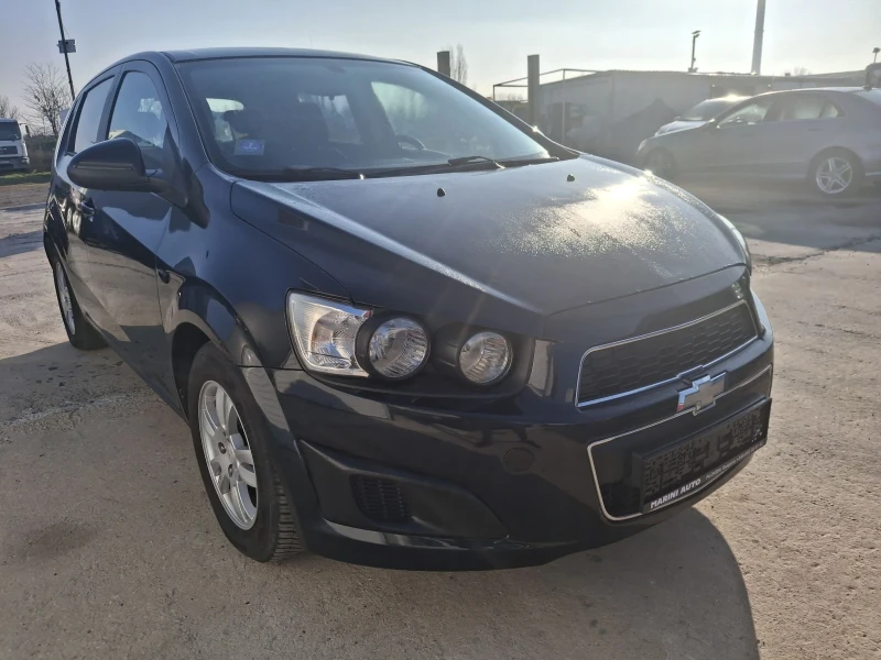Chevrolet Aveo 1.4 климатик , снимка 8 - Автомобили и джипове - 52788561