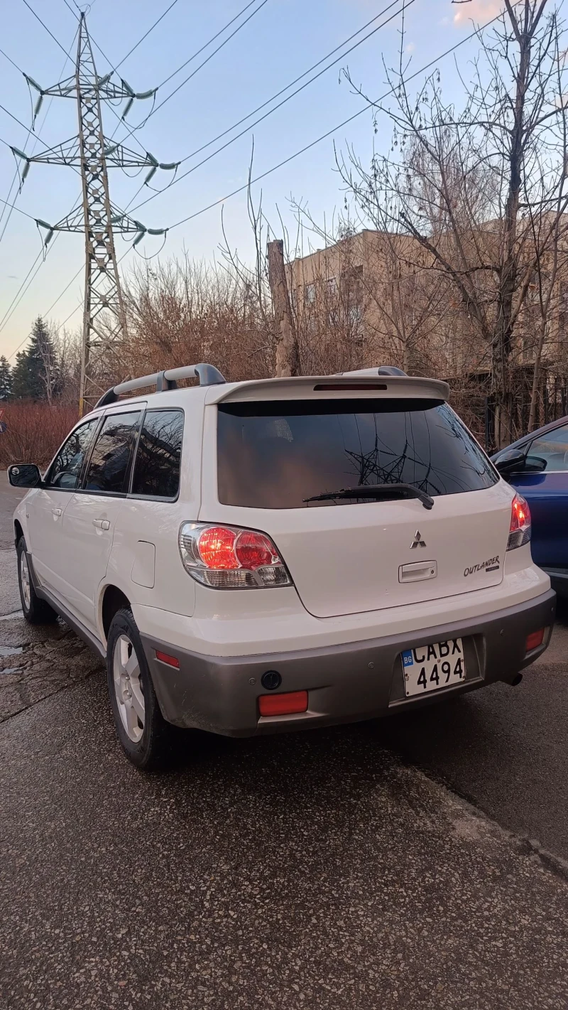 Mitsubishi Outlander 2.4 газ/автомат, снимка 4 - Автомобили и джипове - 48309003