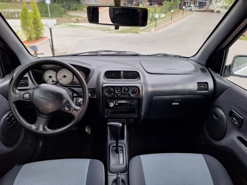 Daihatsu Terios 1.3 БЕНЗ 4х4 АВТОМАТ КЛИМАТИК, снимка 10 - Автомобили и джипове - 46911045