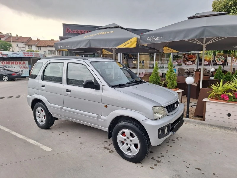 Daihatsu Terios 1.3 БЕНЗ 4х4 АВТОМАТ КЛИМАТИК, снимка 3 - Автомобили и джипове - 46911045