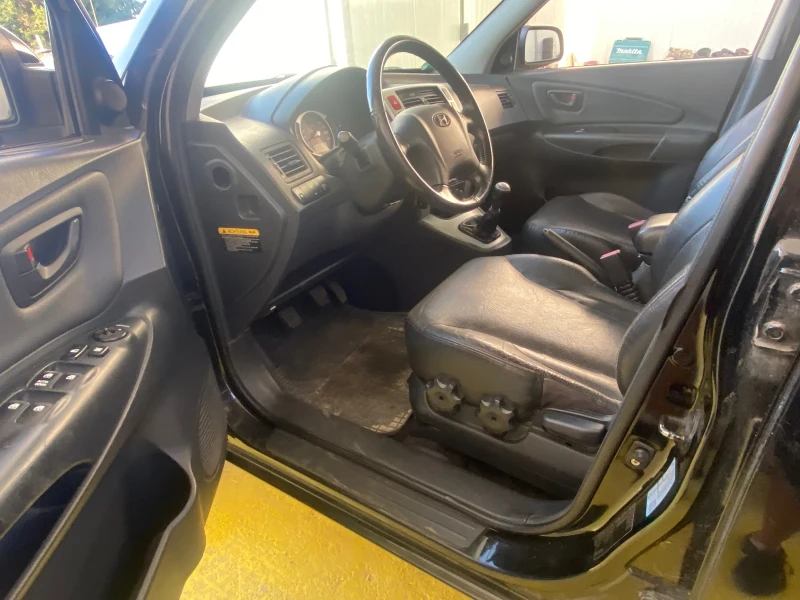 Hyundai Tucson 2.0i 140k.c. , снимка 15 - Автомобили и джипове - 47477058