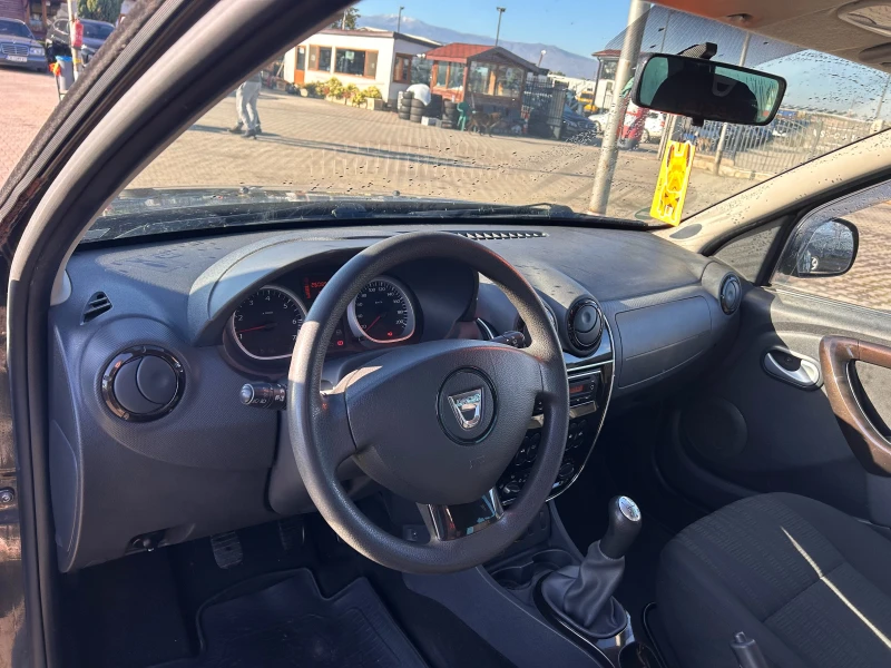 Dacia Duster 1.6i EURO 4, снимка 12 - Автомобили и джипове - 52051560
