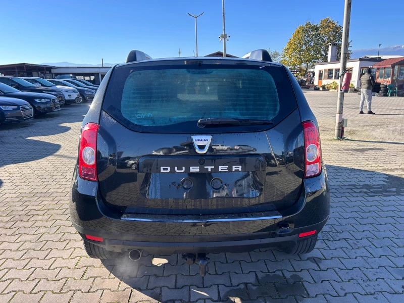 Dacia Duster 1.6i EURO 4, снимка 7 - Автомобили и джипове - 52051560