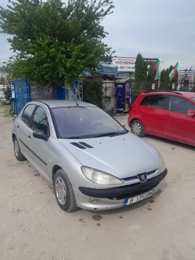 ������ Peugeot 206