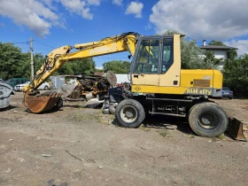 Багер O&K MH city, снимка 1