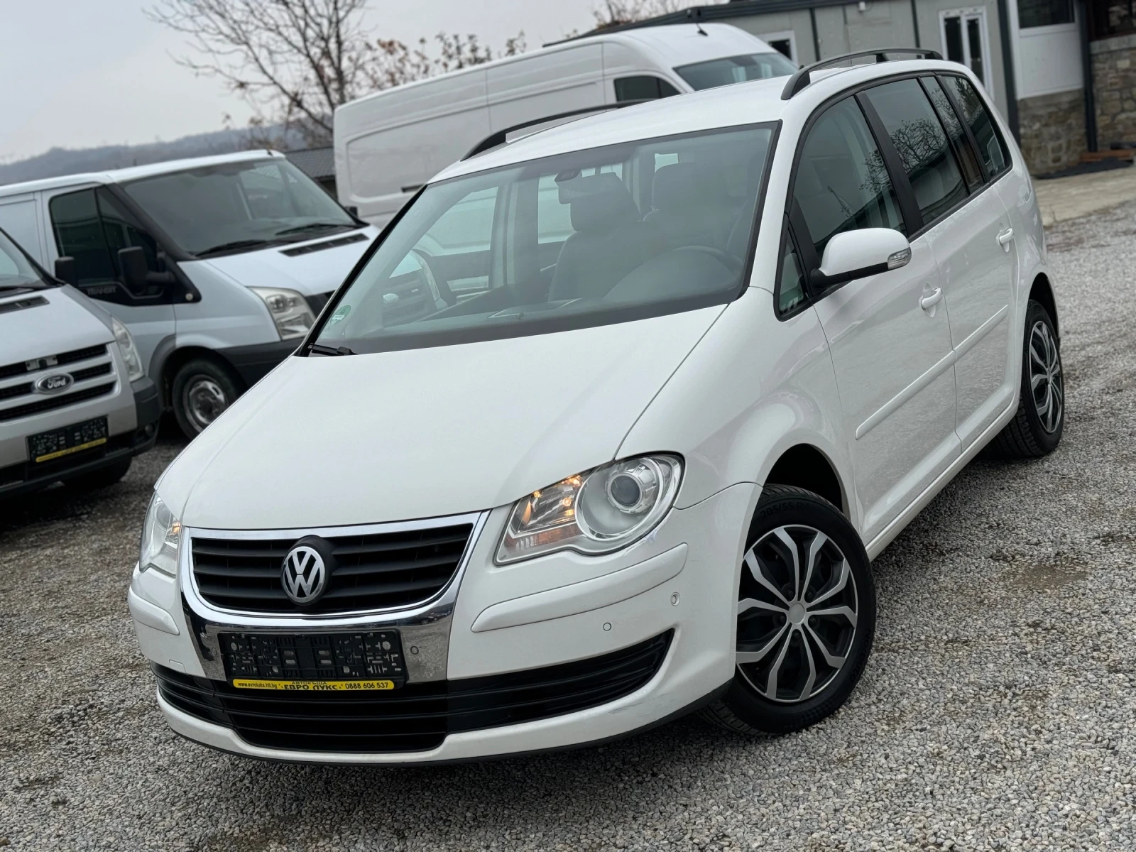 VW Touran 1.9TDI 105кс 6ск НАВИ МУЛТИ PARK ASSIST РЕАЛНИ-КМ - изображение 3