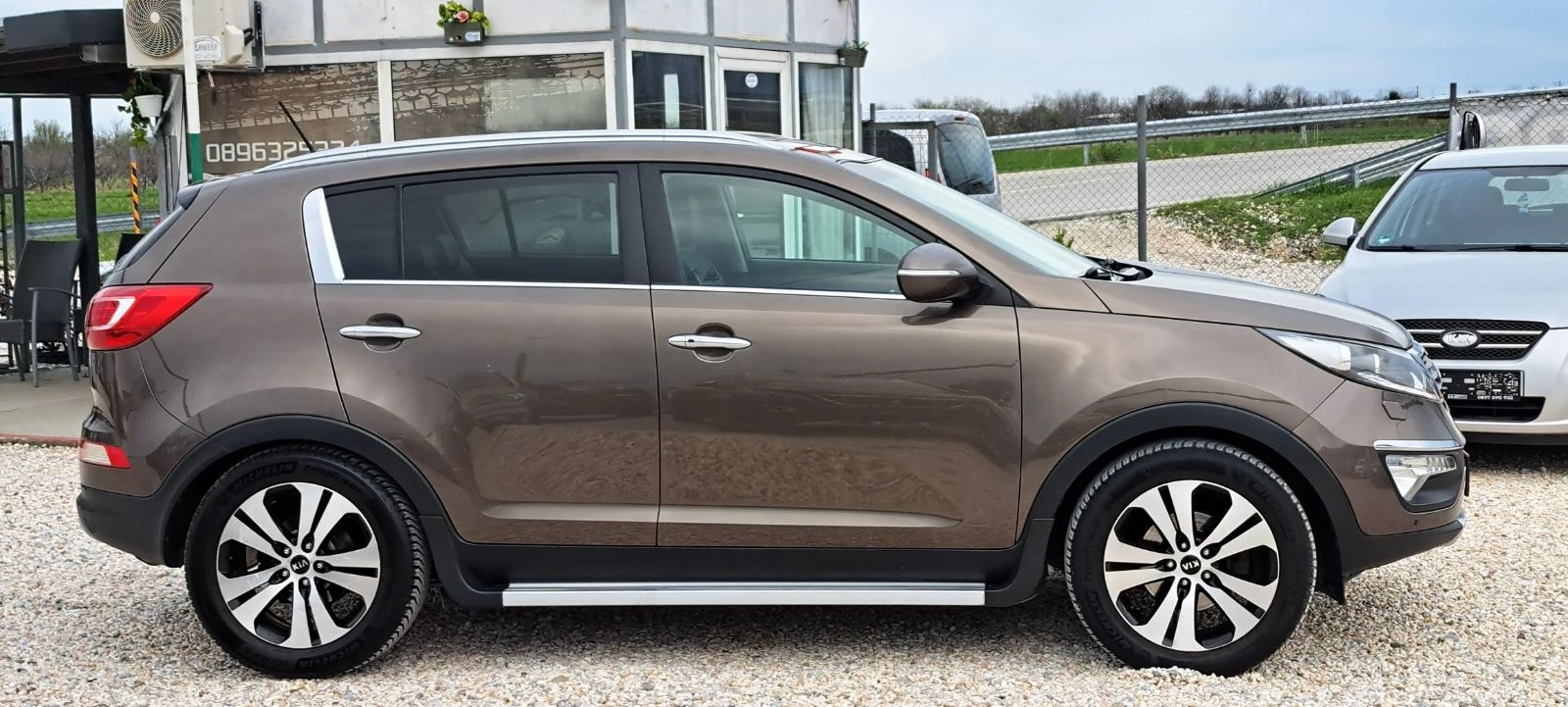 Kia Sportage 2.0i 4x4 Автомат, Кожа, Нави, камера, панорама, снимка 7 - Автомобили и джипове - 54150514