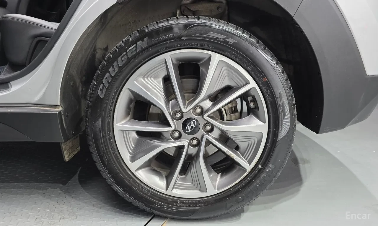 Hyundai Tucson 2.0 Diesel 4WD, снимка 13 - Автомобили и джипове - 54644858