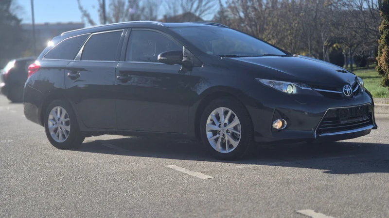 Toyota Auris Touring sports 2.0d4d, снимка 9 - Автомобили и джипове - 52524089