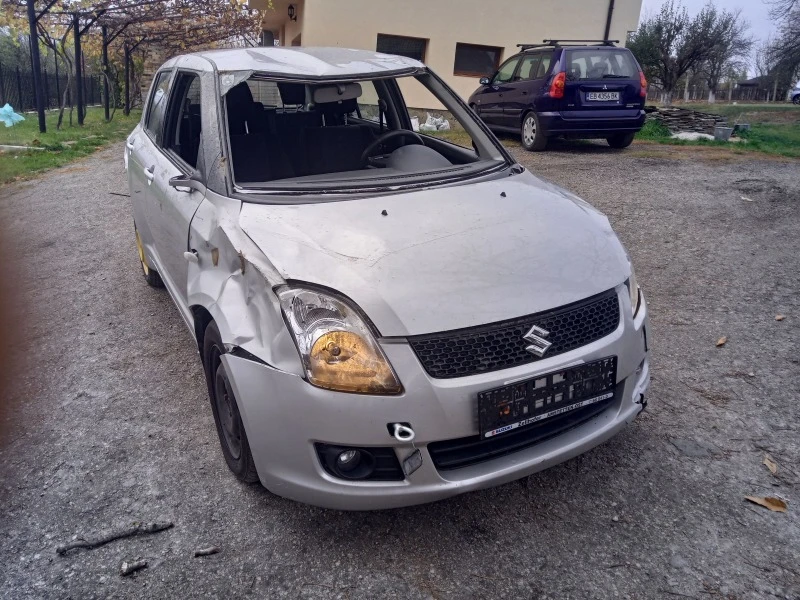 Suzuki Swift 1.3 4х4, снимка 4 - Автомобили и джипове - 38600998