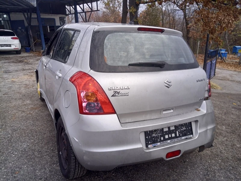 Suzuki Swift 1.3 4х4, снимка 1 - Автомобили и джипове - 38600998