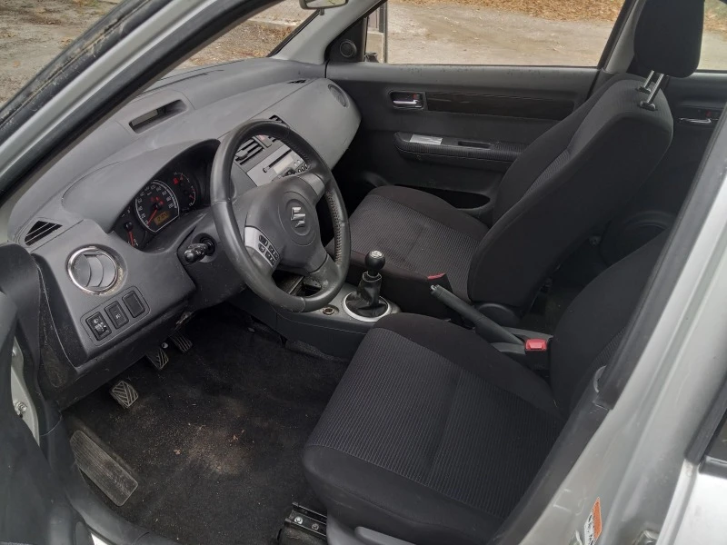 Suzuki Swift 1.3 4х4, снимка 5 - Автомобили и джипове - 38600998