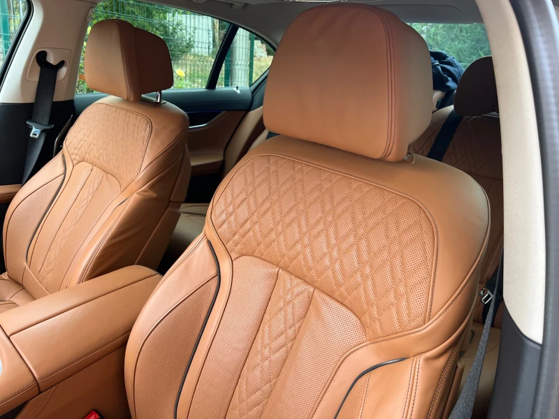 BMW 740, снимка 17 - Автомобили и джипове - 50411536