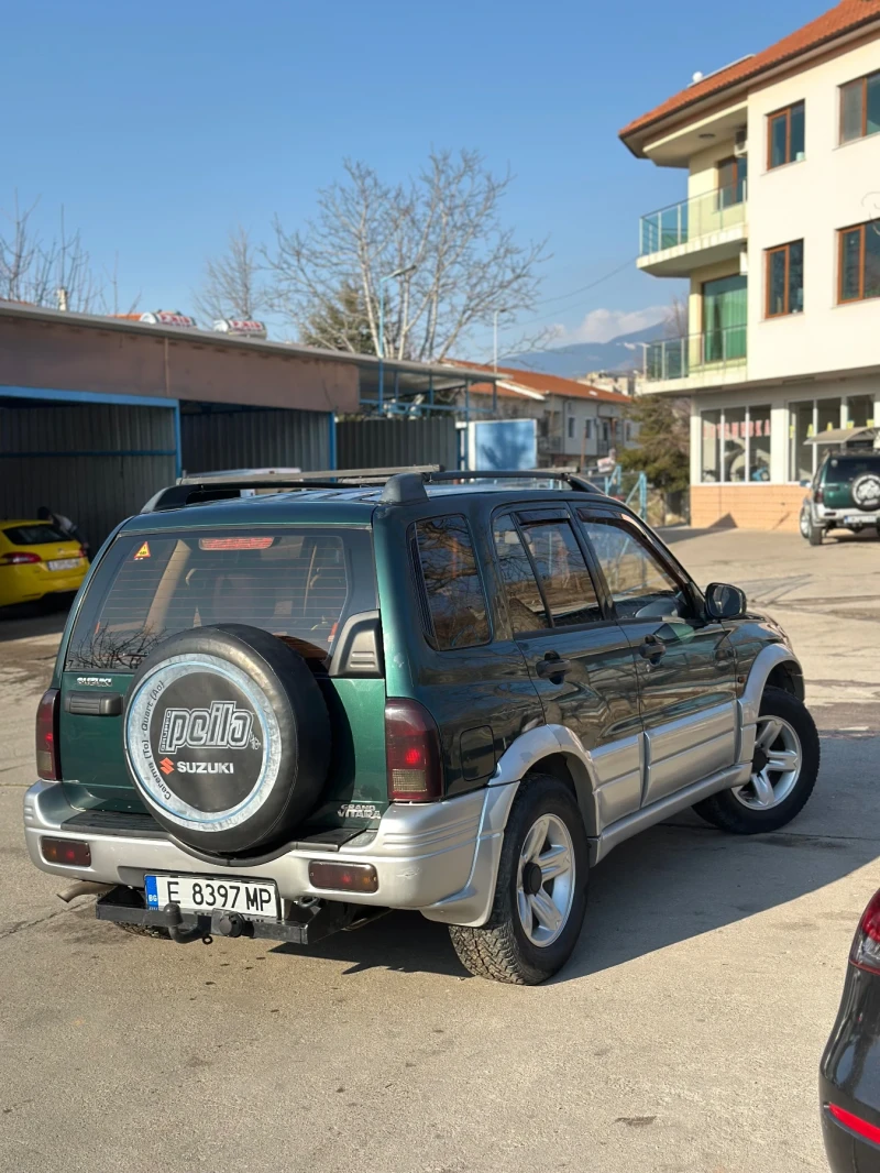 Suzuki Grand vitara, снимка 4 - Автомобили и джипове - 49088895