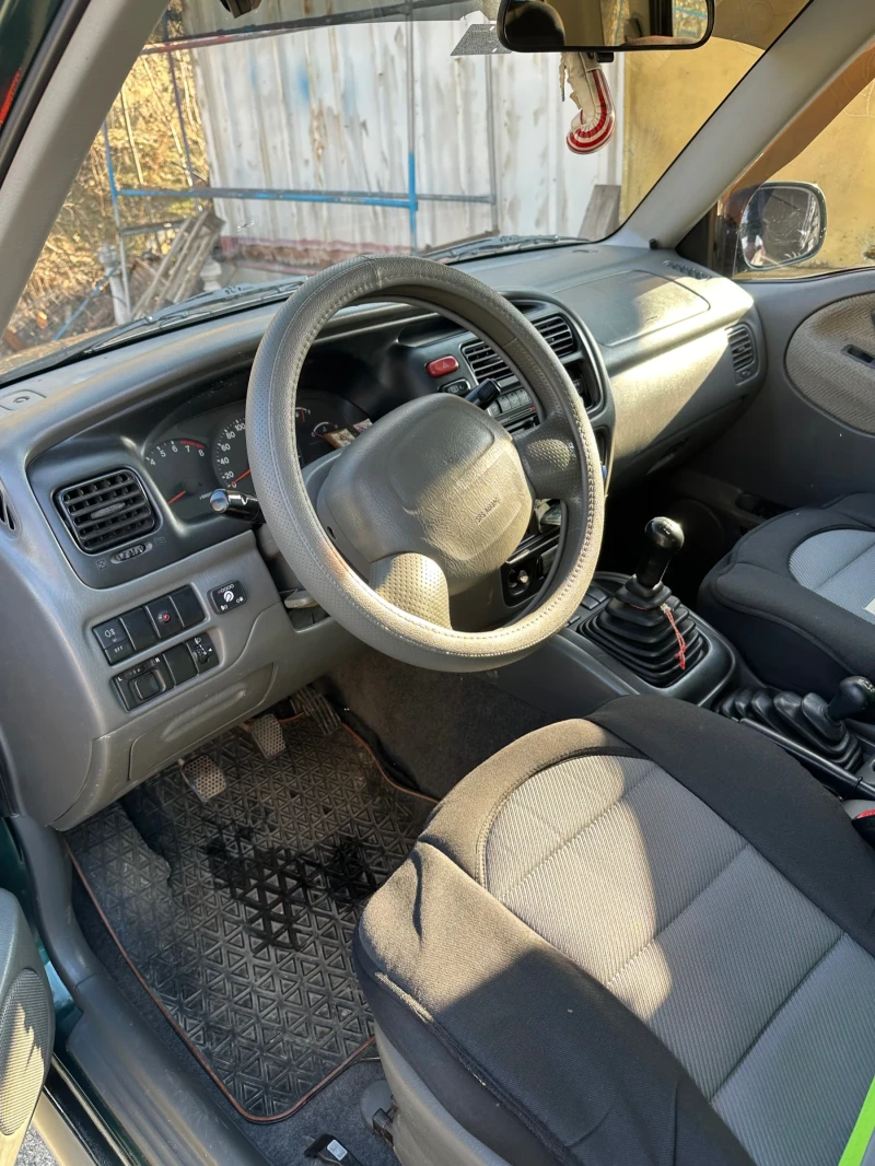 Suzuki Grand vitara, снимка 8 - Автомобили и джипове - 49088895