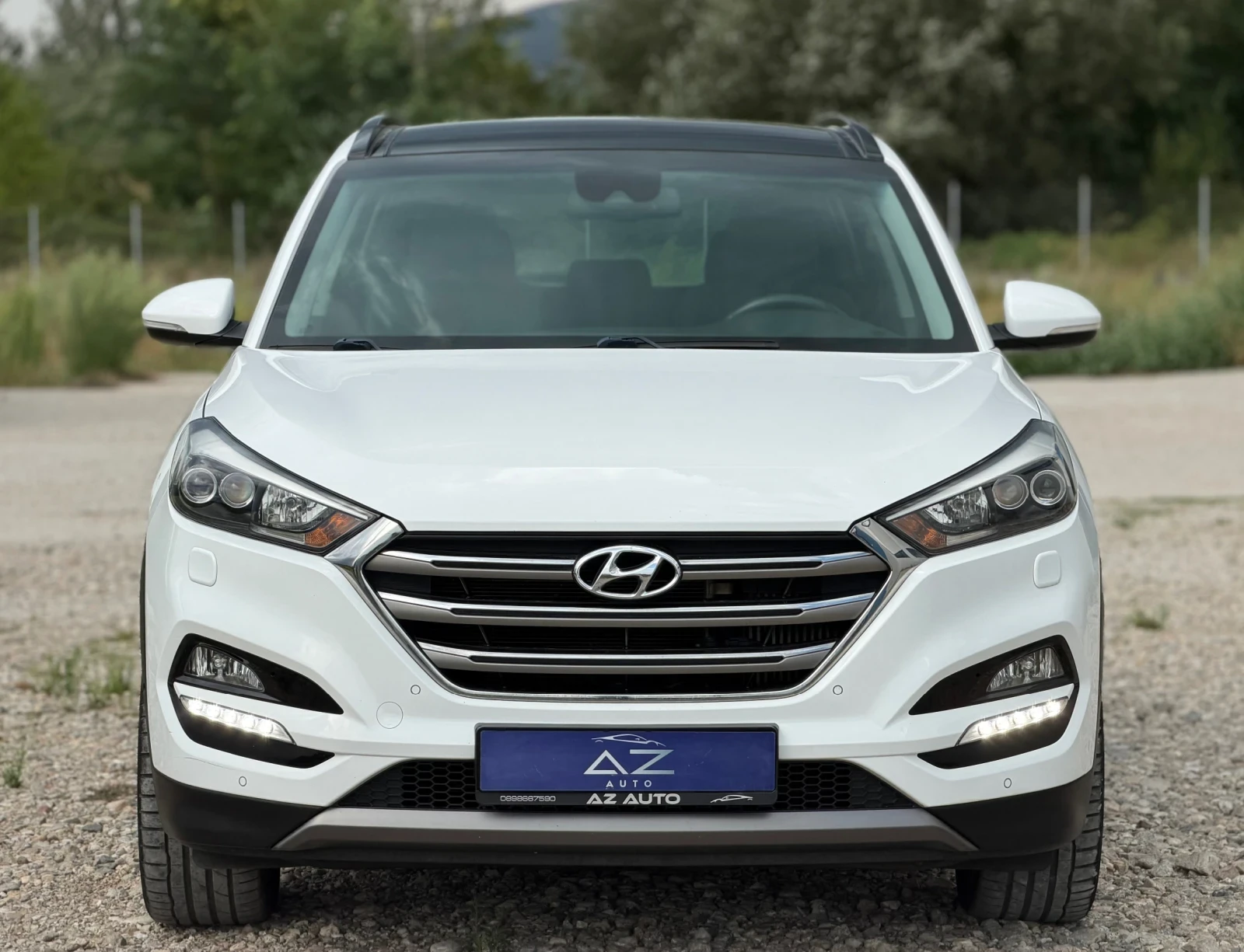 Hyundai Tucson 2.0 CRDi 4x4 Premium/ Всички екстри, снимка 2 - Автомобили и джипове - 55792834