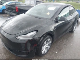 Tesla Model Y LONG RANGE* DUAL MOTOR* КОЖА* ПОДГРЕВ* ПАНОРАМА*  - 20300 € / 39703.35 лв. - 64015547 6