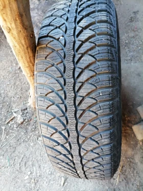 Гуми Всесезонни 185/65R15, снимка 2 - Гуми и джанти - 47602587