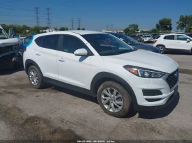 Hyundai Tucson 2.0L I-4 DI, DOHC, VVT, 161HP Front Wheel Drive