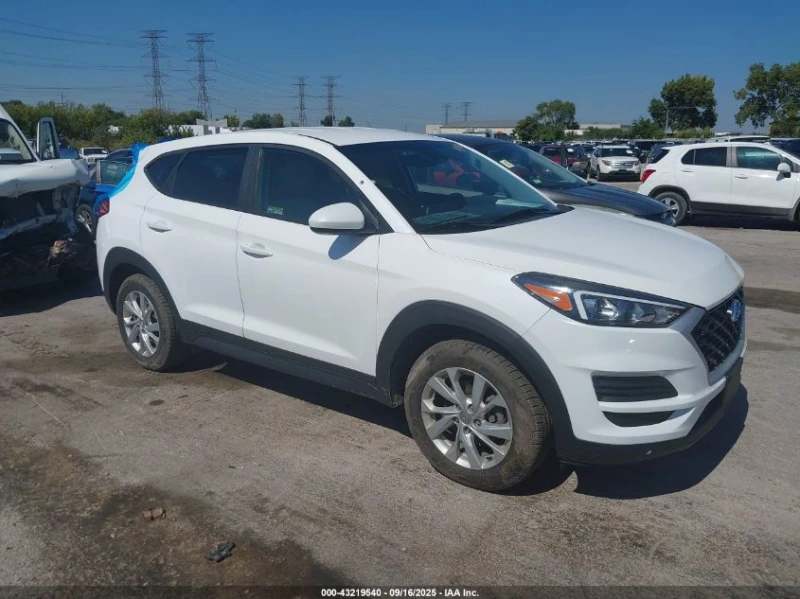 Hyundai Tucson 2.0L I-4 DI, DOHC, VVT, 161HP Front Wheel Drive