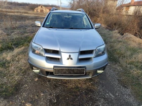 Mitsubishi Outlander 2.4 Газ-бензин 4?4, снимка 1