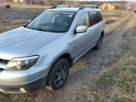 Обява за продажба на Mitsubishi Outlander 2.4 Газ-бензин 4?4 ~6 500 лв. - изображение 1