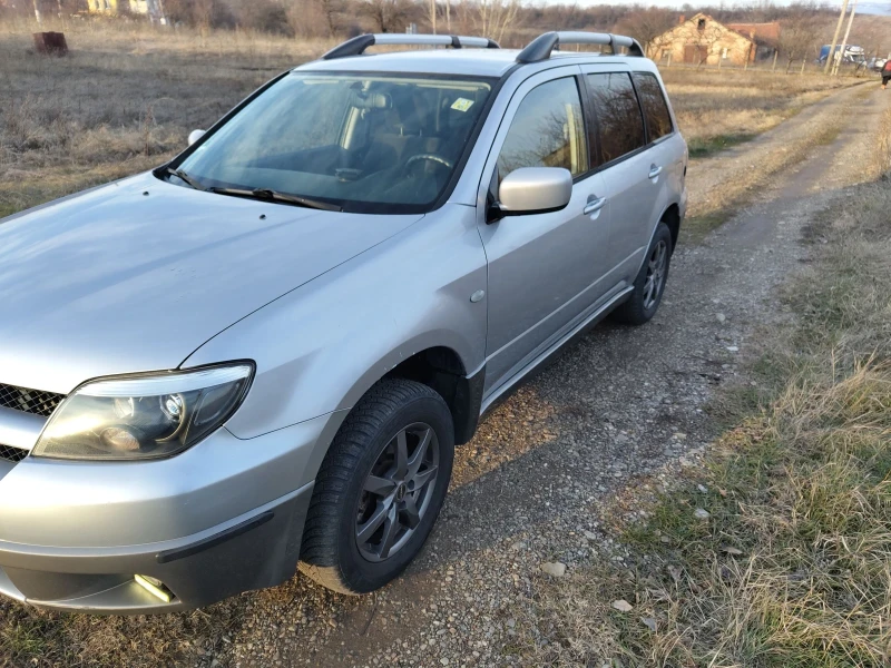 Mitsubishi Outlander 2.4 Газ-бензин 4?4, снимка 2 - Автомобили и джипове - 52924180