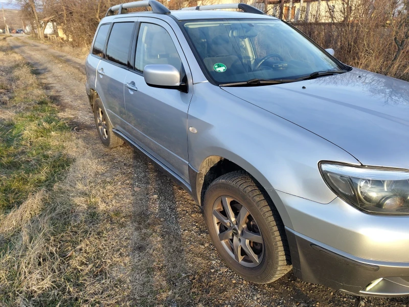 Mitsubishi Outlander 2.4 Газ-бензин 4?4, снимка 3 - Автомобили и джипове - 52924180