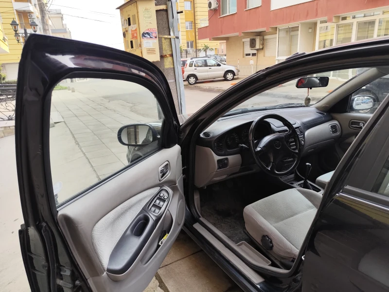 Nissan Almera, снимка 7 - Автомобили и джипове - 49301907