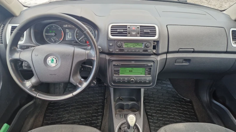 Skoda Roomster 1.4 TDI 80 кс., снимка 14 - Автомобили и джипове - 53045281