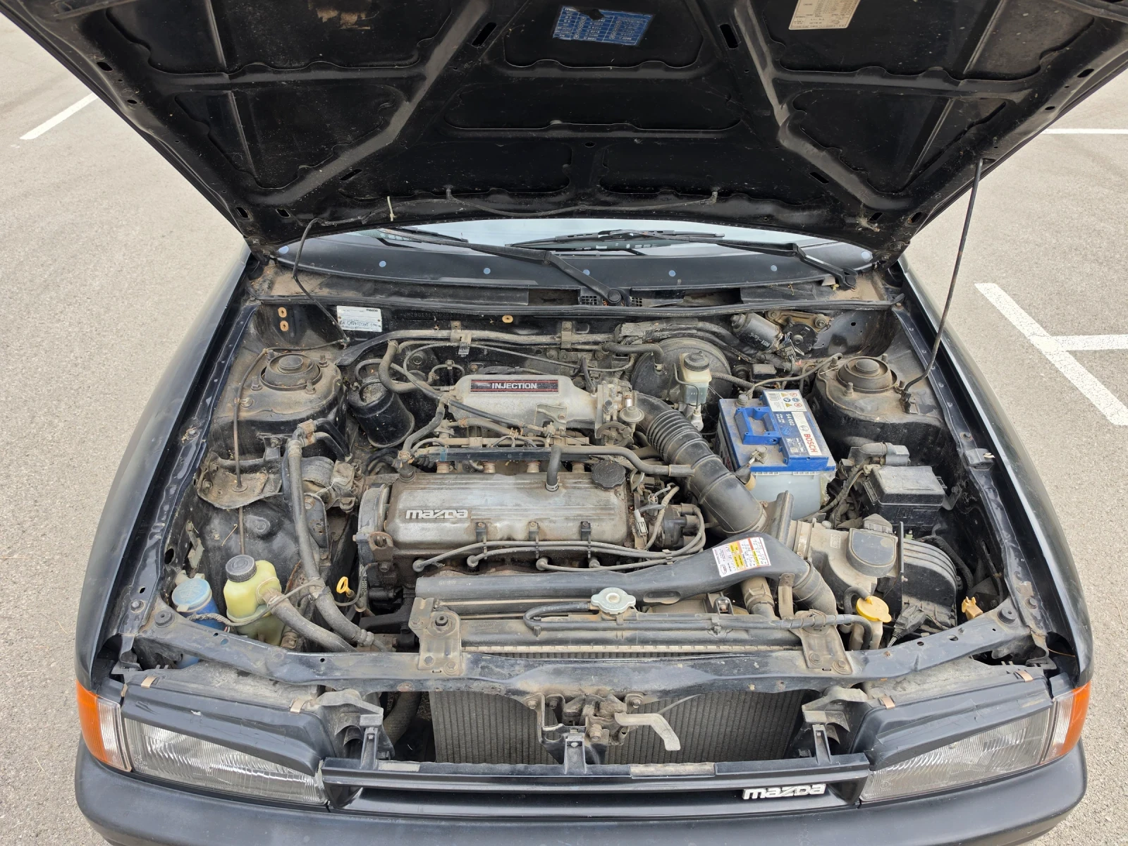 Mazda 323, снимка 11 - Автомобили и джипове - 56040368