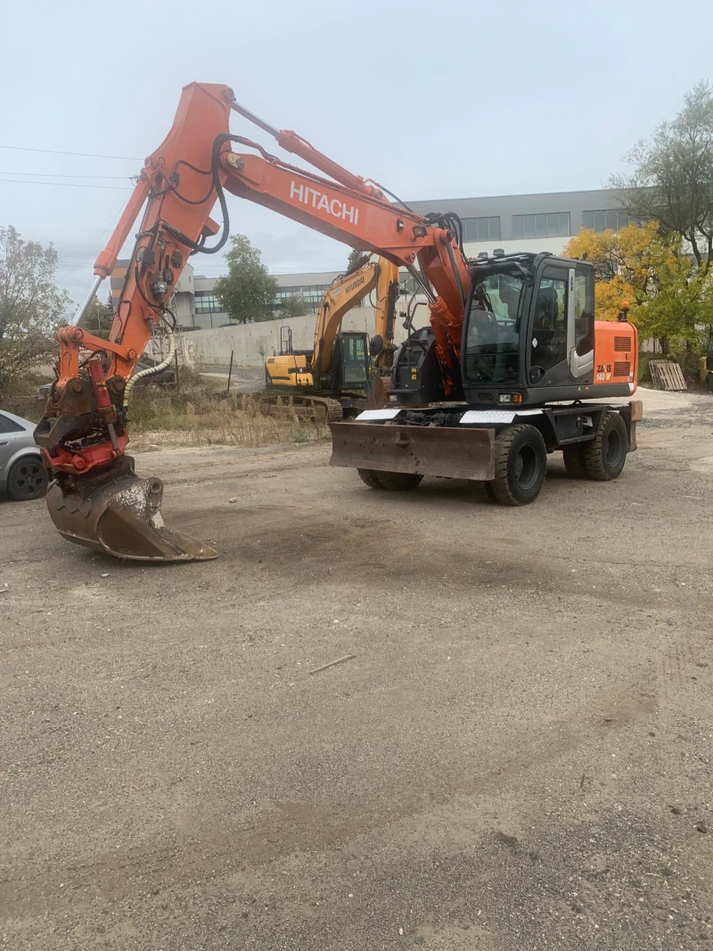 Багер Hitachi ZX140-3W