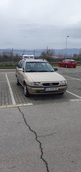Opel Astra, снимка 1 - Автомобили и джипове - 45271651
