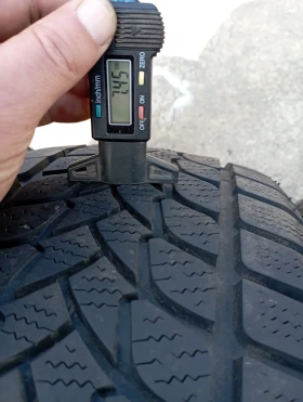 Гуми Зимни 235/60R16, снимка 9