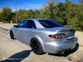 ������ Mazda 6