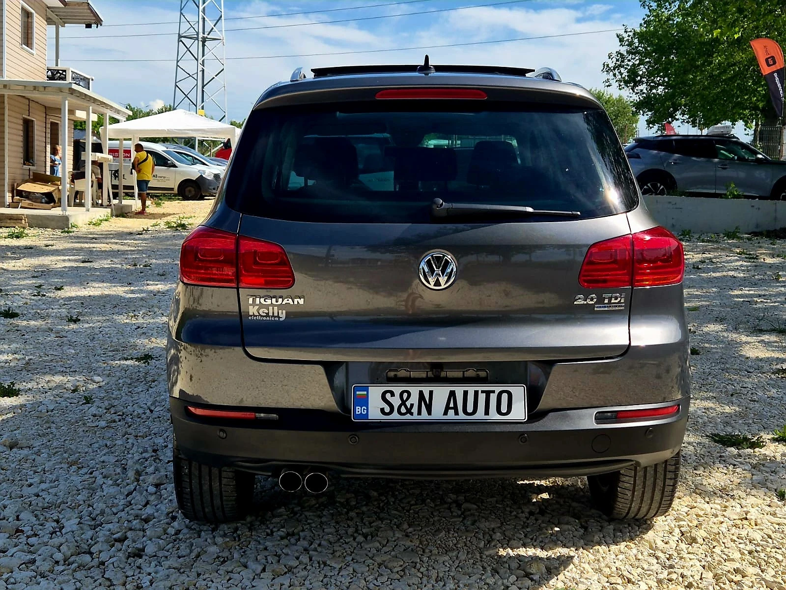 VW Tiguan 2.0 TDI BLUE MOTION/CAM., снимка 7 - Автомобили и джипове - 54945912