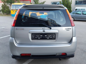 Suzuki Ignis 1.3i 90hp 4x4 * КЛИМАТИК * EURO 4 * , снимка 3