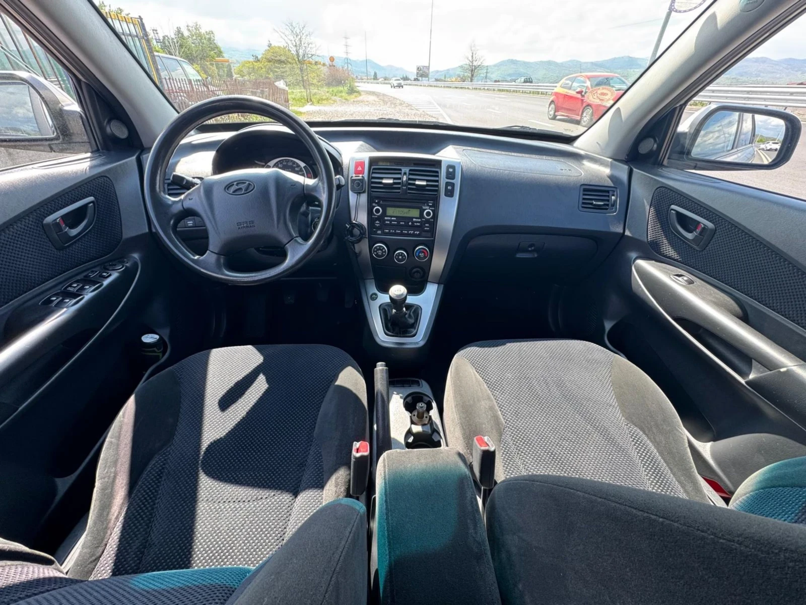 Hyundai Tucson 2.0 газ-бензин, снимка 10 - Автомобили и джипове - 54386279