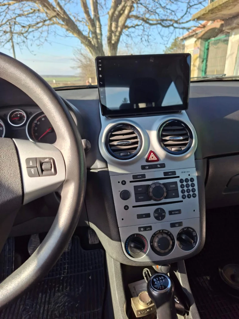 Opel Corsa Corsa D 1.4i , снимка 14 - Автомобили и джипове - 53491714