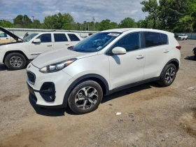 ������ Kia Sportage