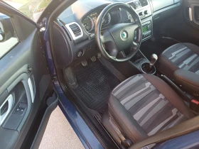 Skoda Roomster 1.6 бензин, снимка 9