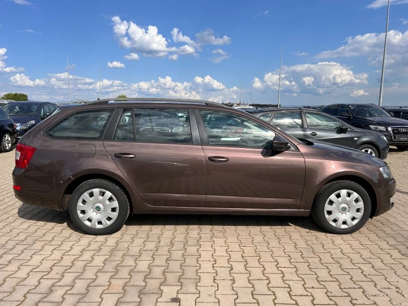 Skoda Octavia 2.0TDI 4X4 NAVI/KOJA EURO 5 ЛИЗИНГ, снимка 5 - Автомобили и джипове - 45303700