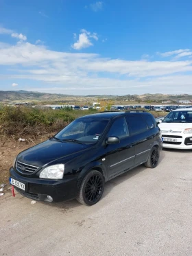 ������ Kia Carens