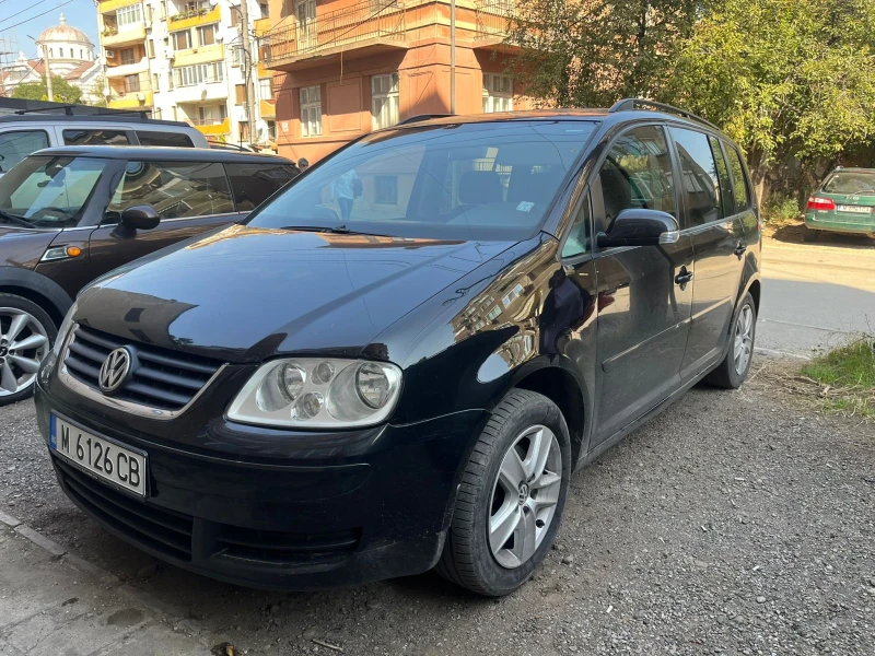 VW Touran 1.9 ТДИ 131 кс 7 места обслужен от до , снимка 1 - Автомобили и джипове - 47315079