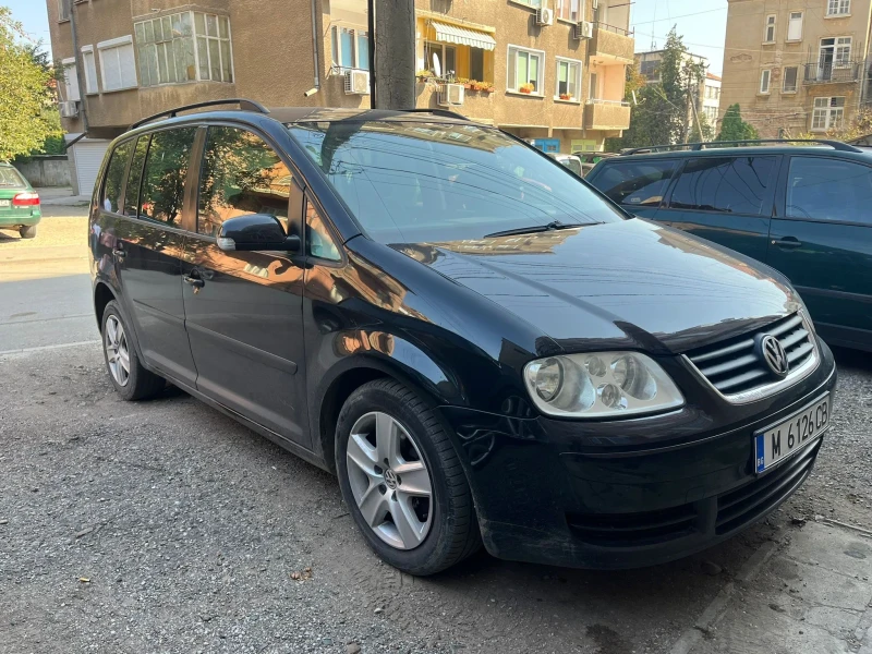 VW Touran 1.9 ТДИ 131 кс 7 места обслужен от до , снимка 2 - Автомобили и джипове - 47315079